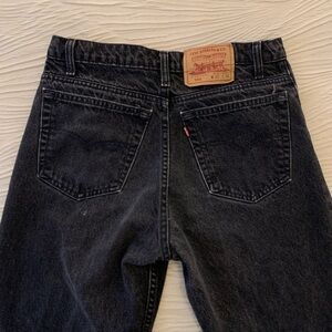 Vintage Faded Black Levi’s 550 Relaxed Tapered Jeans, made in Canada